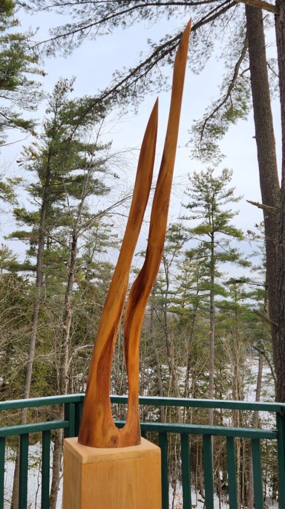 FLAME 68" tall including a 16"x 9"x 9" pine base 0