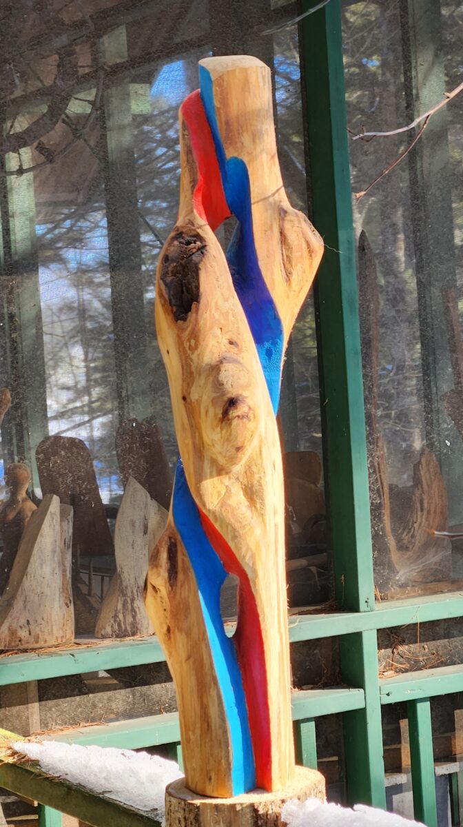 Couple with red and blue 34" tall, butternut wood, 0